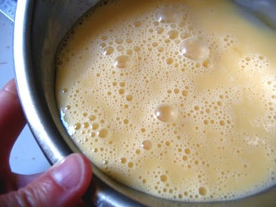 shot of scrambled egg mix for decadent scrambled eggs