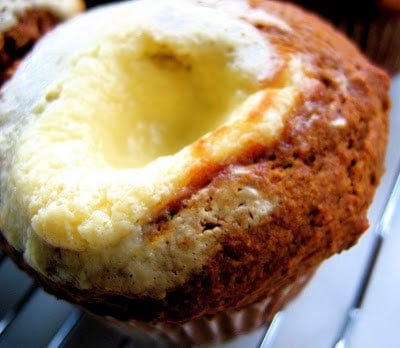 close up of pumpkin cheesecake muffin