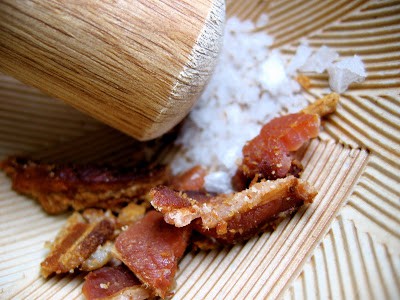 bacon and salt being crushed