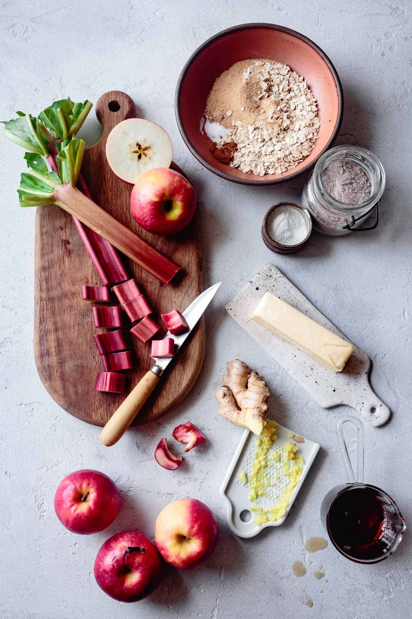Ingredients for healthy apple rhubarb crisp with ginger and maple