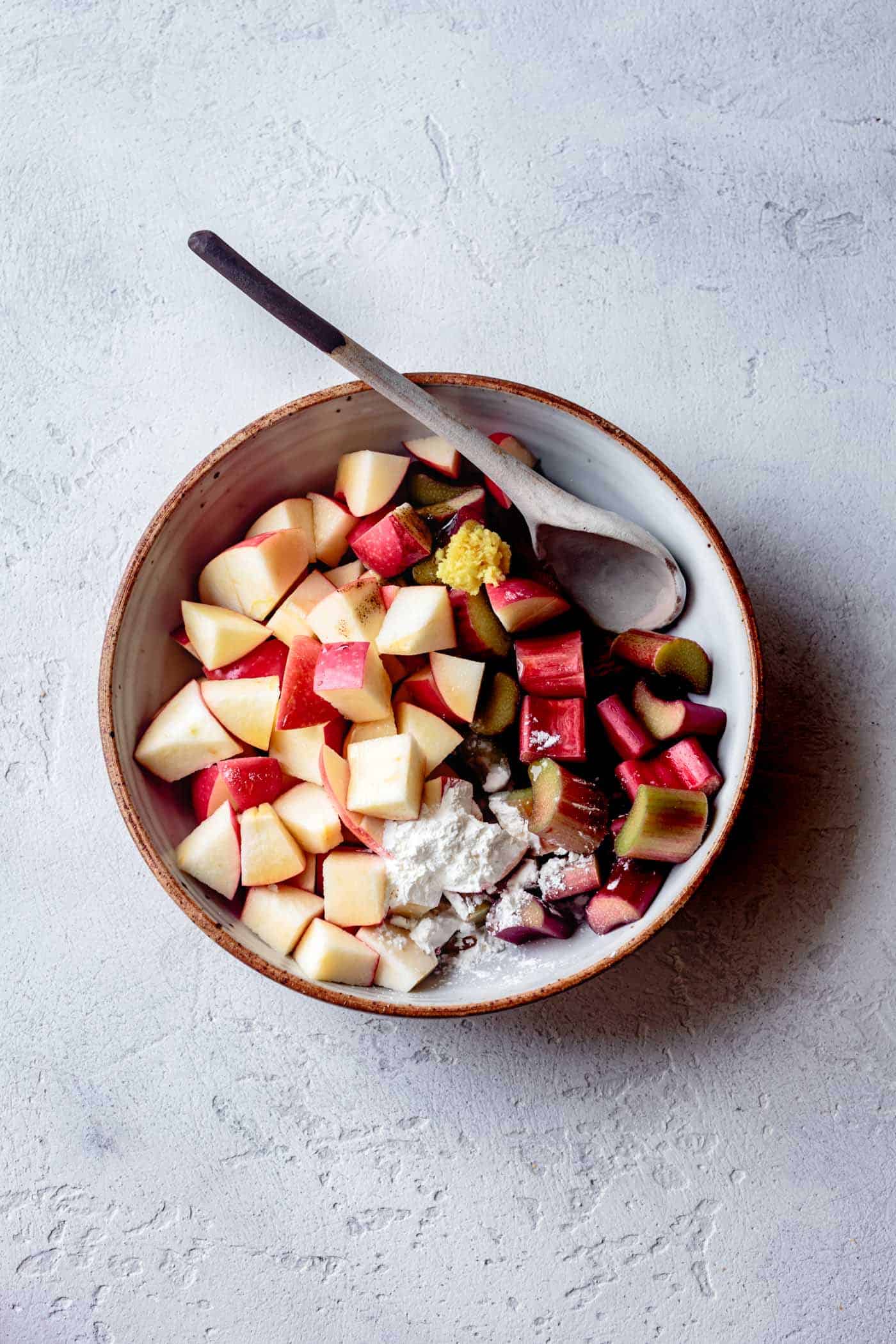 Filling for apple rhubarb crumble in a bowl