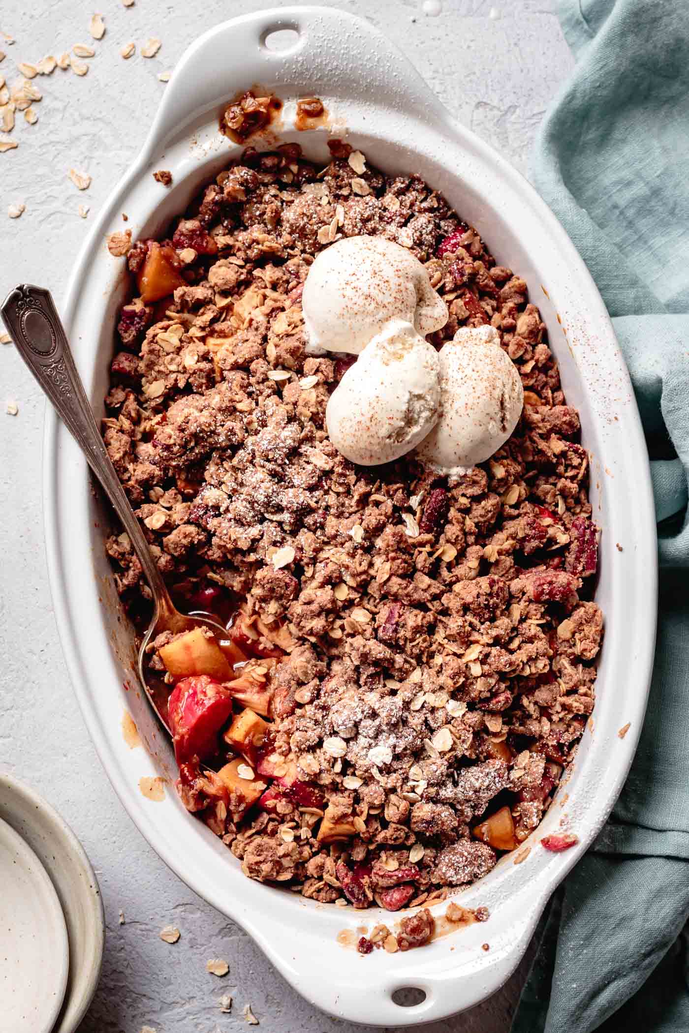 vegan gluten-free apple rhubarb crisp topped with ice cream