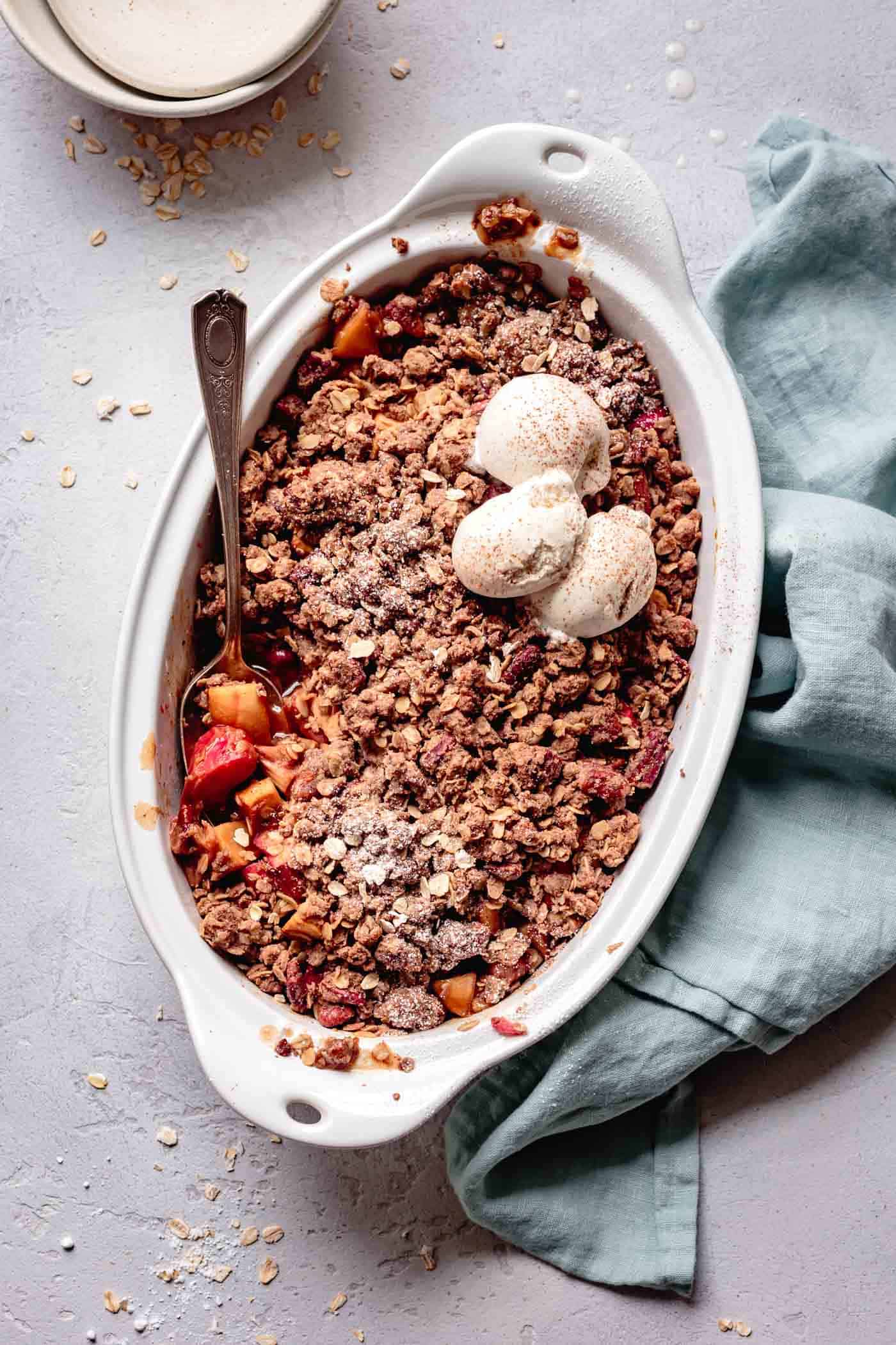 Baked rhubarb and apple crisp with ginger and maple
