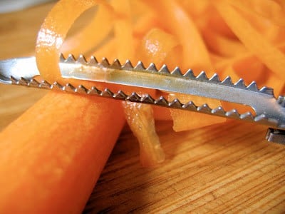 carrots being peeled