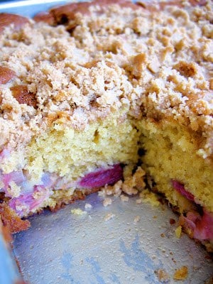 sliced rhubarb coffee cake with piece taken out