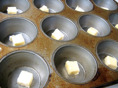 knobs of butter in muffin molds