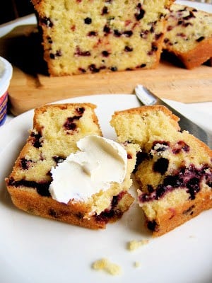 slices of lemon huckleberry tea cake on a plate