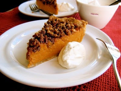 sweet potato pie topped with pecans 