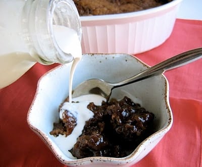 cream being poured onto pudding