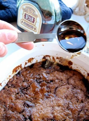 top down shot of sauce being poured onto pudding