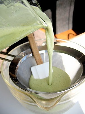 mint mix being poured into a sieve