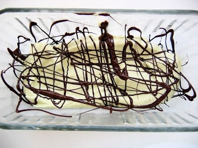 chocolate drizzled on a tray 