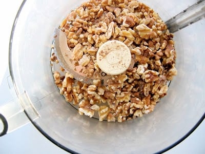 walnuts in a blender for lentil walnut vegan pate