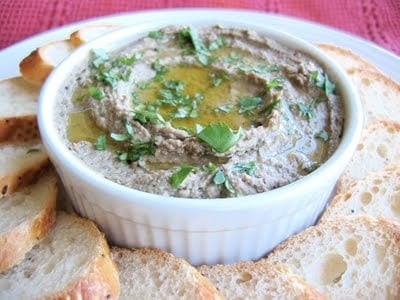 a delicious bowl of lentil walnut vegan pate with baguette