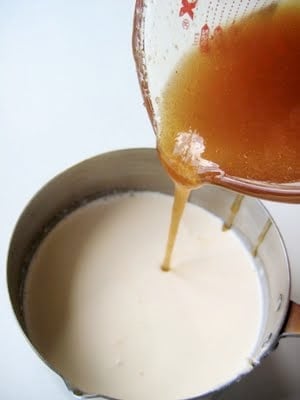 honey being poured into ice cream mix 