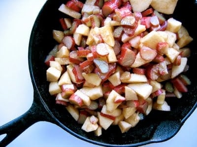 apples and rhubarb cooking in a pan 