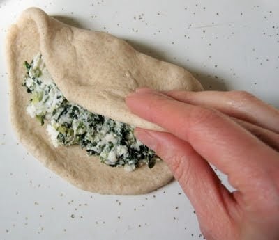 calzone being folded 