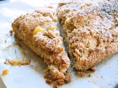 a slice of poppy seed and lemon curd mega scone