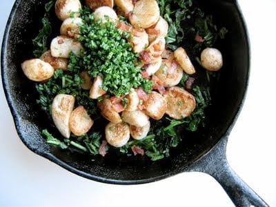 roasted turnips cooking in a skillet 