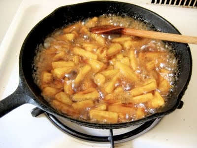 pineapples in a skillet cooking 