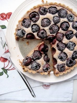 top down shot of cherry tart on table 