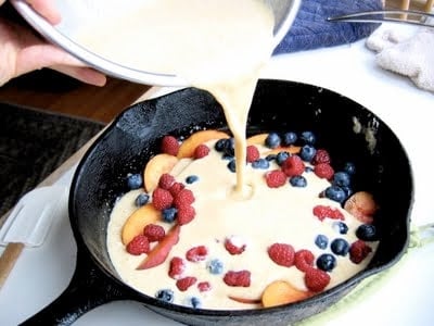 pancake batter poured onto skillet 