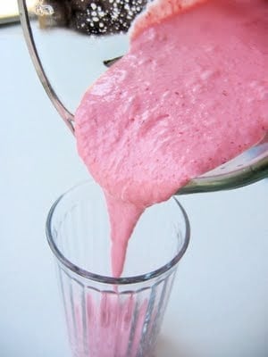 berry shake poured into a glass