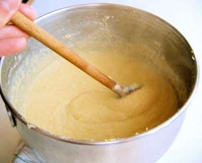 grits stirred in a pot 