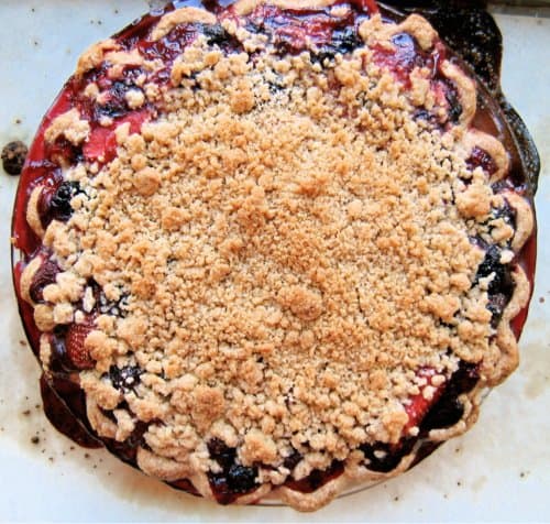 top down shot of berry crumble in baking dish