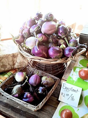 fresh eggplants in a basket 