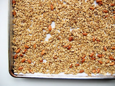 top down shot of granola on baking tray 