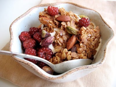 bowl of honey granola and spoon 