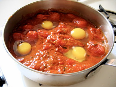 tomatoes and eggs in a pot 