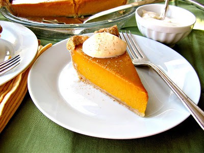slice of creamy pumpkin pie on a plate 