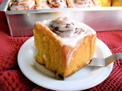 pumpkin spice cinnamon roll on plate 