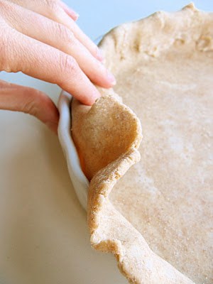 quiche crust being folded 