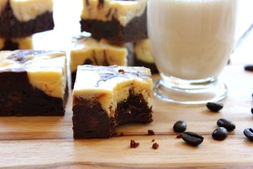 squares of brownies with a glass of milk 