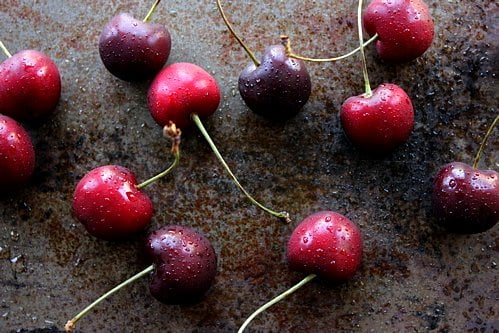 cherries on a table top