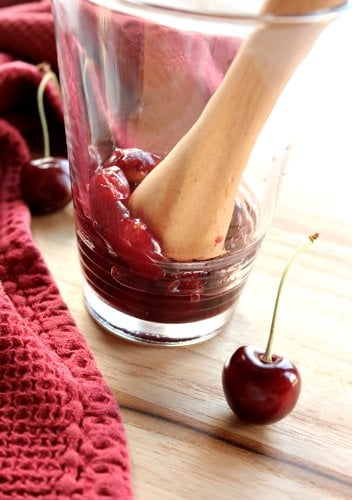 cherries being muddled 