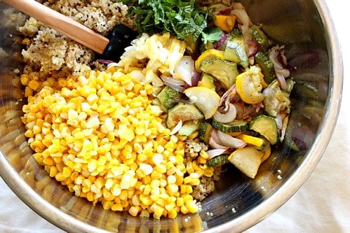 corn being mixed in a bowl 