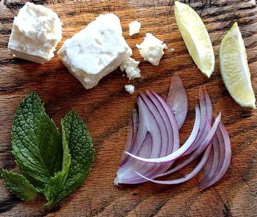 feta onion and mint on a table 