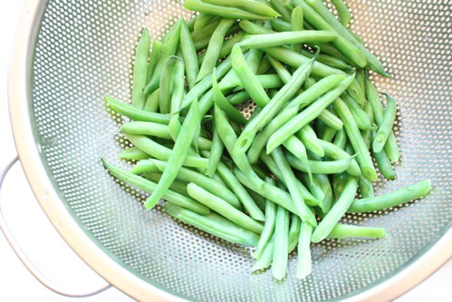 green beans in a sieve