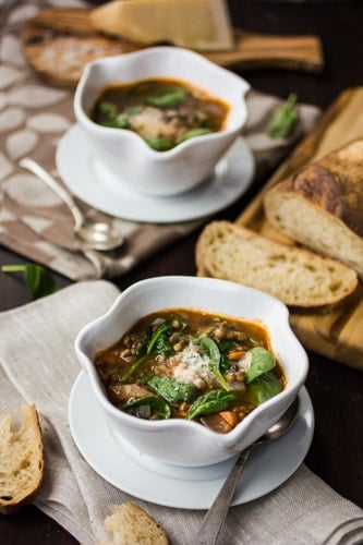 bowls of spinach soup on table