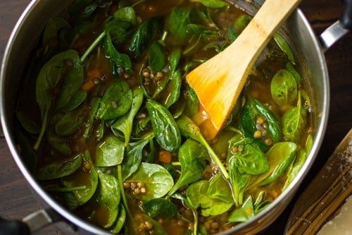 spinach cooking in a pot 