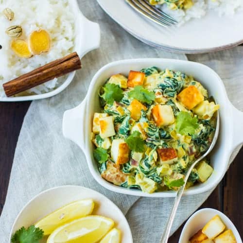 table with chard saag paneer in a bowl 