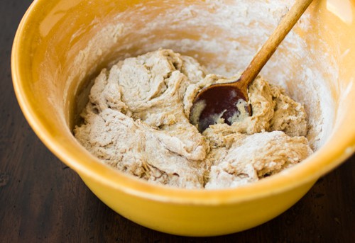 dough in bowl being mixed 