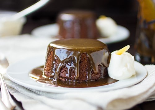 close up of sticky toffee pudding on a plate 