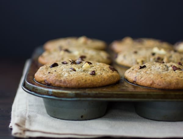 tray of gluten free buckwheat muffins with banana, chocolate, and nuts