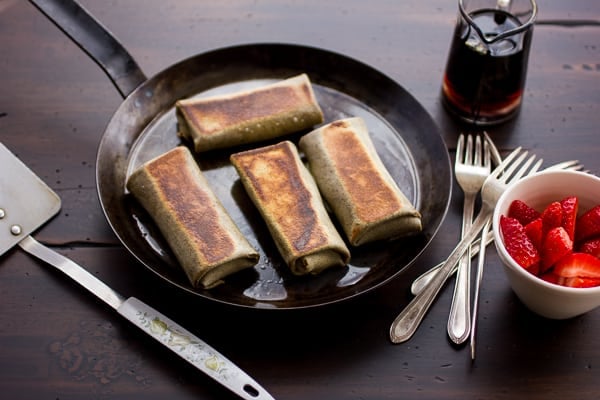 buckwheat cheese blintzes in a skillet 