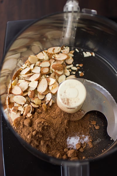 almonds and cocoa in a blender 